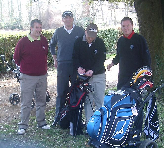 IMGP5344.JPG - The Captain's  fourball leaves the 18th